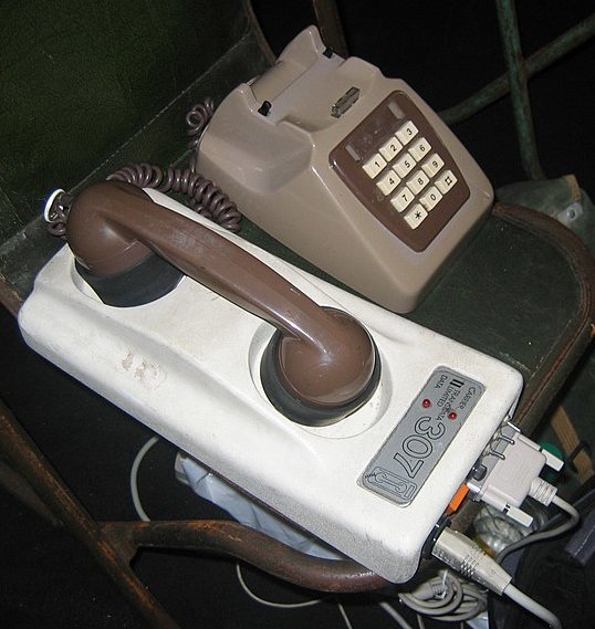 an acoustic coupler with a landline phone - by secretlondon123, CC-BY-SA 2.0